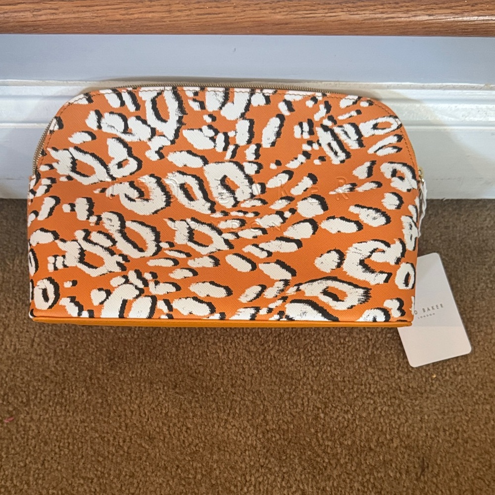 Ted Baker Orange, White and Black Leopard Print Cosmetic Pouch
Brand New!